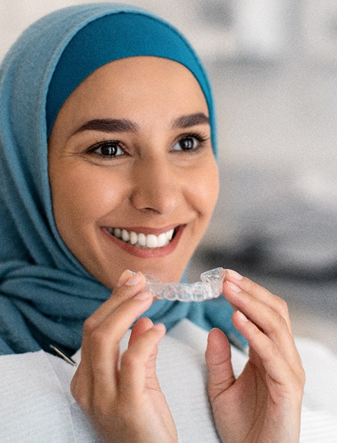 Closeup of patient wearing clear aligner